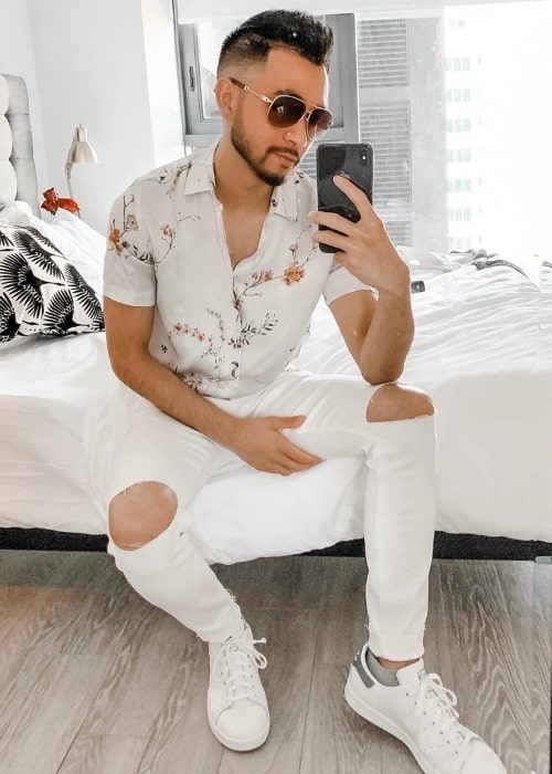 Alex Moy as seen while taking a mirror selfie in August 2019