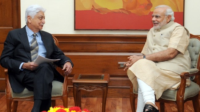 Azim Premji (Left) and Narendra Modi as seen in October 2014