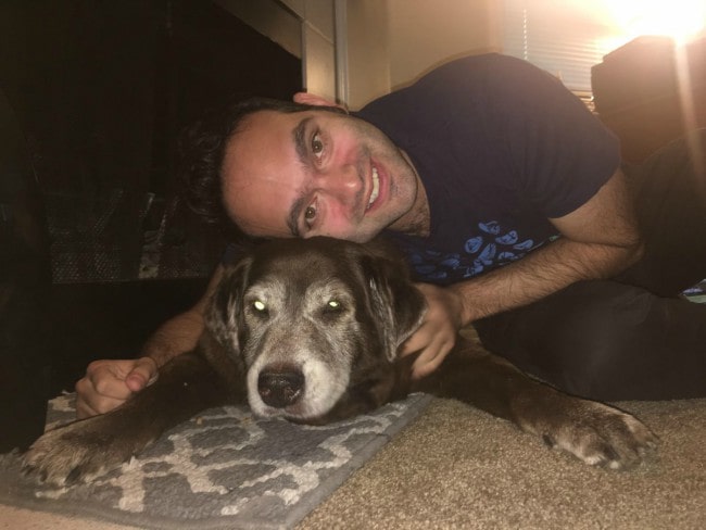 Benny Fine with his dog as seen in 2017