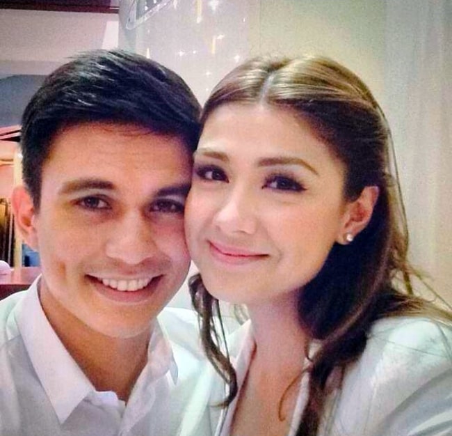 Carla Abellana as seen while smiling for a picture alongside Tom Rodriguez