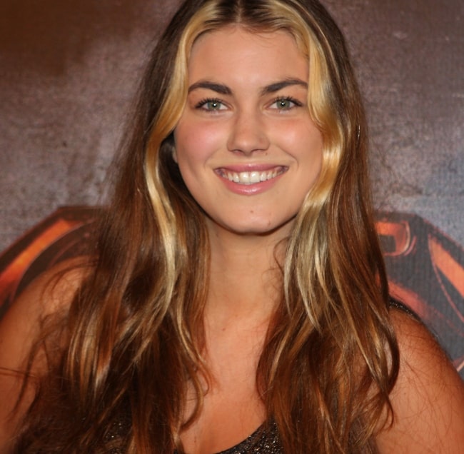 Charlotte Best as seen while smiling in a picture taken at 'Man Of Steel' red carpet movie premiere in Sydney in June 2013