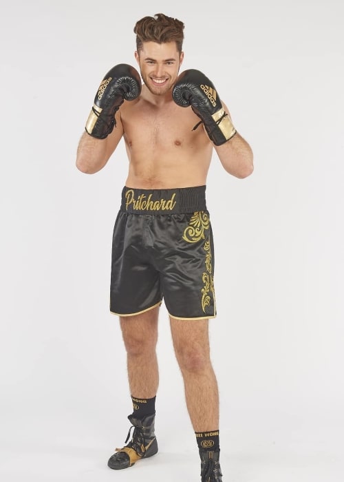 Curtis Pritchard as seen in a picture taken while wearing a custom made boxing attire in December 2019