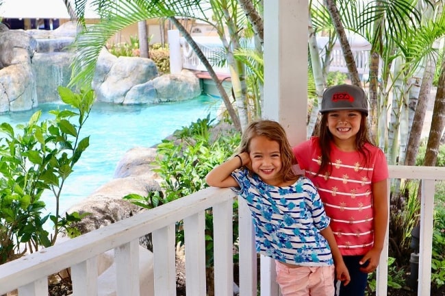 Evelin Bennett (Right) as seen while posing for a picture alongside her sister, Cora Bennett, at Turtle Beach Resort in Barbados in April 2018