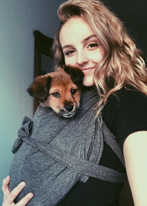 Evie Clair with her dog as seen in January 2019