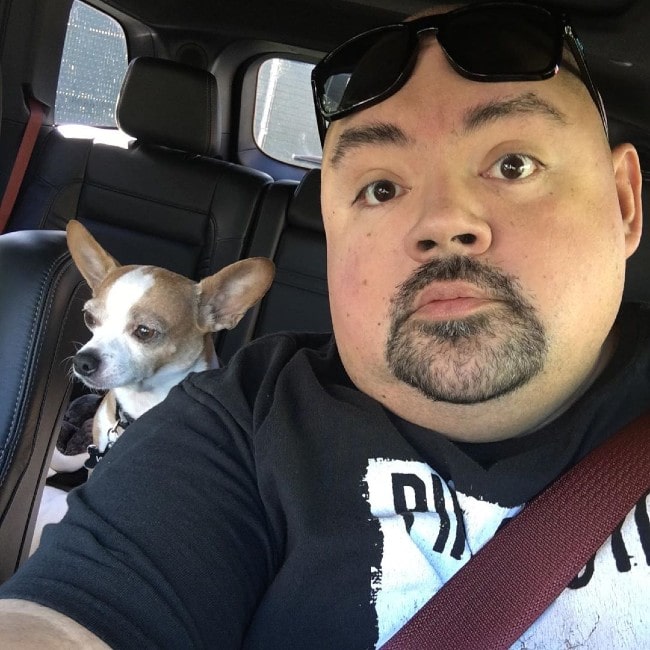 Gabriel Iglesias with his dog as seen in November 2019