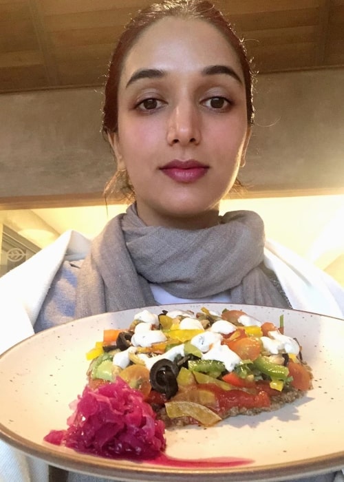 Ira Trivedi as seen in a picture taken while holding a healthy vegan meal in September 2019