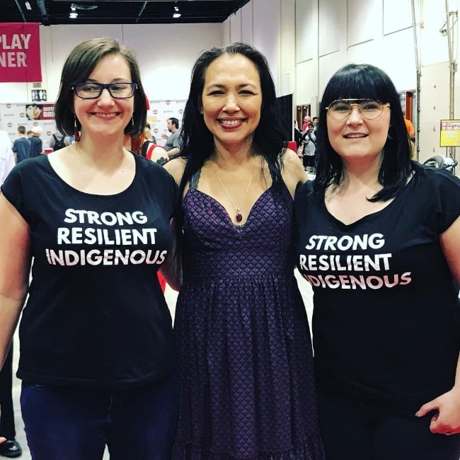 Irene Bedard (Center) as seen while posing for a picture in Calgary, Alberta, Canada in June 2018