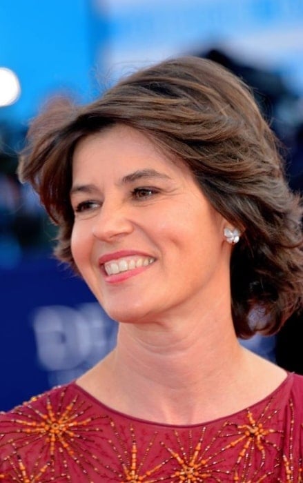 Irène Jacob as seen while smiling in a picture taken at the Deauville American Film Festival in September 2017