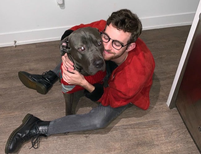 Jack Dodge with his dog as seen in December 2018