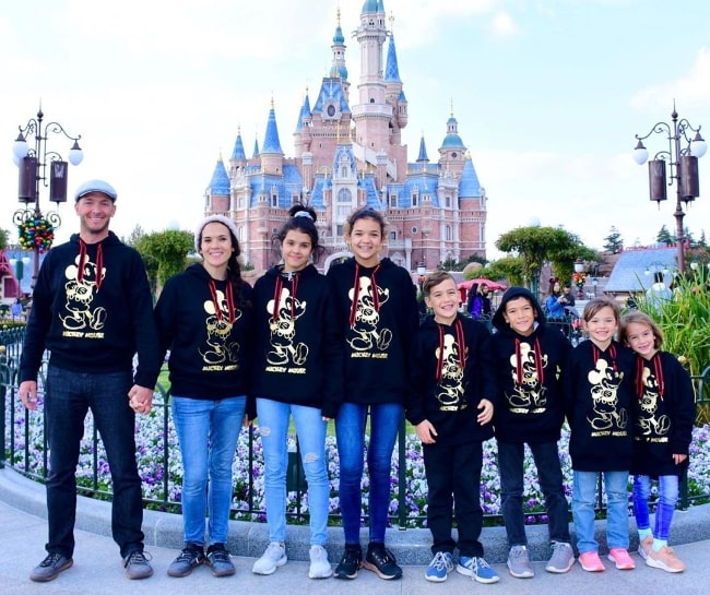 Jase Bennett as seen while posing for a picture alongside his family at Shanghai Disneyland Park located in Pudong, Shanghai, China in November 2019