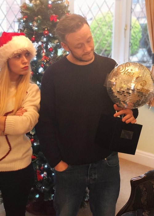 Joanne Clifton as seen in a picture with her brother Kevin Clifton while holding the Strictly Come Dancing series trophy in December 2018