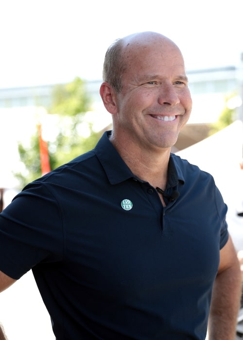 John Delaney smiling while speaking with supporters at the Des Moines Register's Political Soapbox at the 2019 Iowa State Fair in Des Moines, Iowa, United States