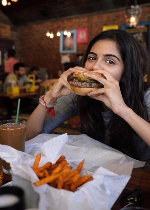 Kalyani Priyadarshan as seen in a picture taken while relishing a burger at Bareburger in July 2018