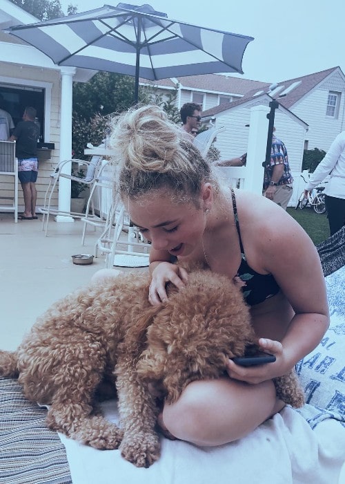 Katie Donnelly with a dog as seen in June 2018