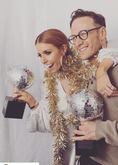 Kevin Clifton as seen in a picture with his beau journalist, dancer, and TV presenter Stacey Dooley holding their winning trophies from series 16