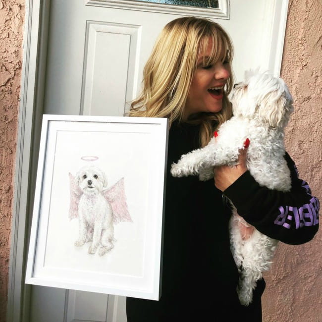 Melissa Gisoni with her dog as seen in December 2019