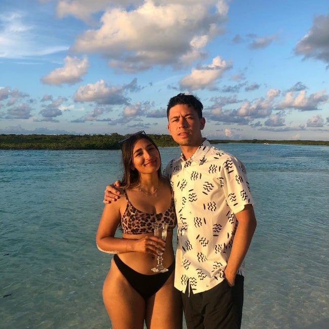 Noel Miller as seen while posing for a picture with a stunning backdrop alongside Aleena in The Bahamas in July 2019