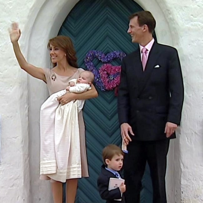 Princess Marie of Denmark as seen with her family at the royal christening of Danish Princess Athena in Mogeltonder Church in May 2012