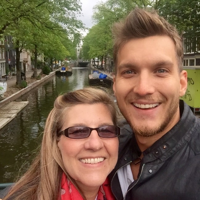 Scott Michael Foster as seen while posing for a picture along with his mother in Amsterdam, Netherlands