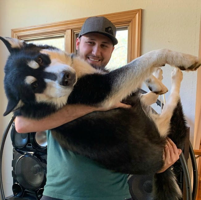 Taras Kulakov with his dog as seen in November 2019