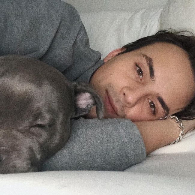 Tyde Levi with his dog as seen in June 2019