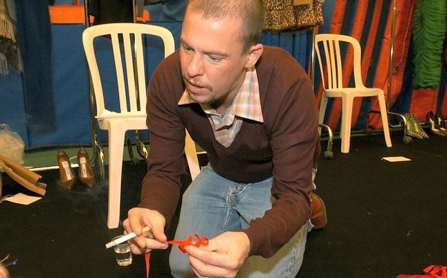 Alexander McQueen prepararing for a fashion show