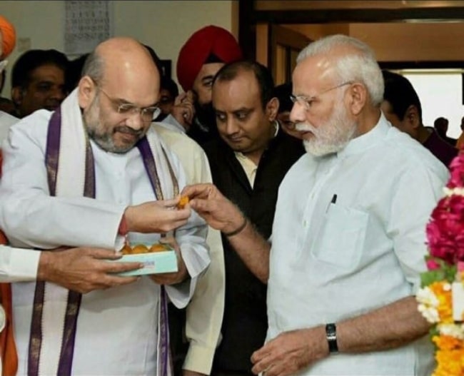 Amit Shah (Left) as seen in a picture along with Prime Minister Narendra Modi in August 2017