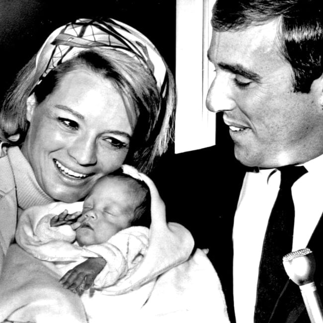 Angie Dickinson as seen in a picture taken with her husband-composer Burt Bacharach and their new born baby in 1966