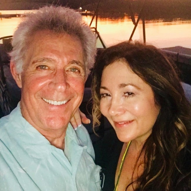 Barry Williams with his wife as seen in July 2019