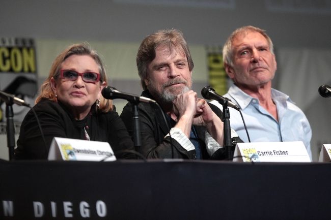 Carrie Fisher, Mark Hamill, and Harrison Ford speaking at the San Diego Comic-Con International for Star Wars The Force Awakens in 2015