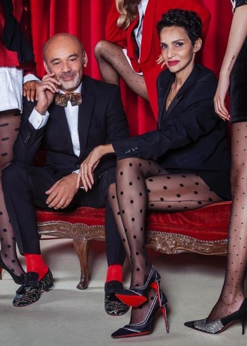 Christian Louboutin as seen while posing for the camera along with Farida Khelfa-Seydoux in October 2019