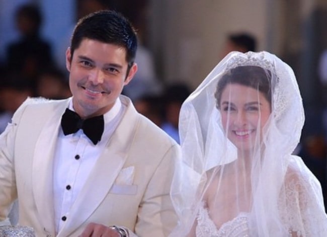 Dingdong Dantes as seen while smiling in his wedding picture alongside Marian Rivera