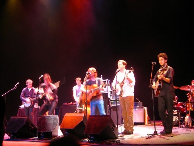 Ed performing onstage with Old Crow Medicine Show in Michigan in 2009