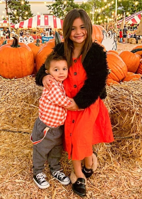 Jayden Foley as seen while posing for the camera alongside his sister during their time in a pumpkin patch in October 2019