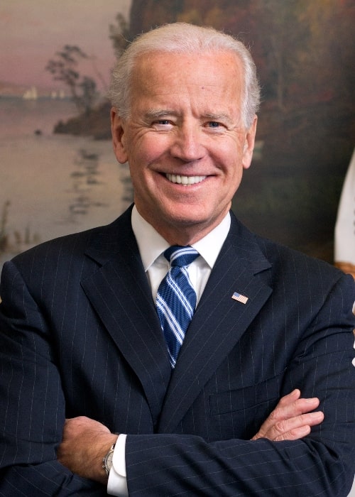 Joe Biden as seen while smiling in a picture taken in his West Wing Office at the White House in January 2013