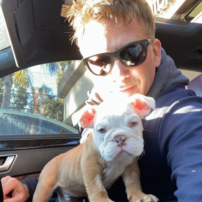 Joe Flanigan with his dog as seen in January 2020