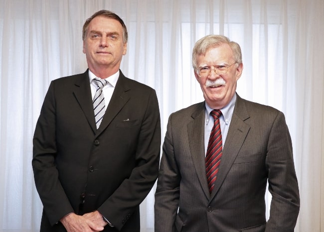 John Bolton (Right) as seen while posing for a picture along with the 38th president of Brazil Jair Bolsonaro in November 2018