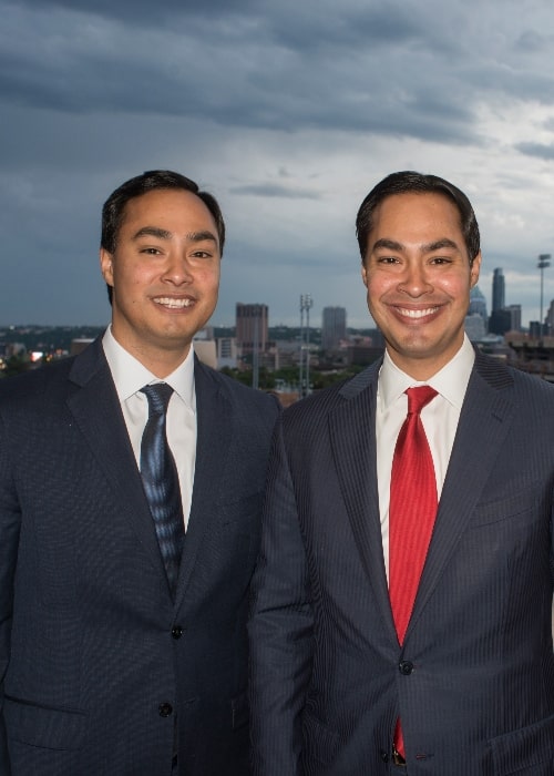 Julian Castro (Right) as seen while posing for the camera along with his twin brother, Joaquin Castro, in April 2013
