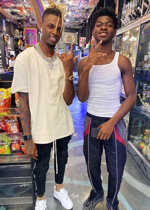 King Nique&King (Left) as seen while posing for a picture alongside Lil Nas X at Melrose Avenue in Los Angeles, California, United States in September 2019
