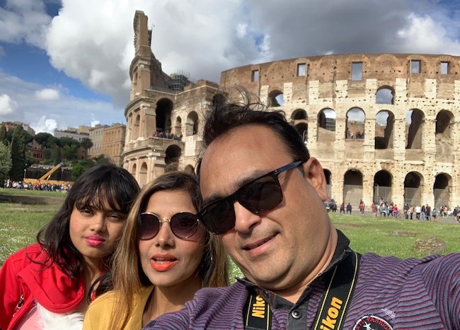 Mausumi Das Chatterjee with her husband and daughter at Colosseum in Italy in 2019