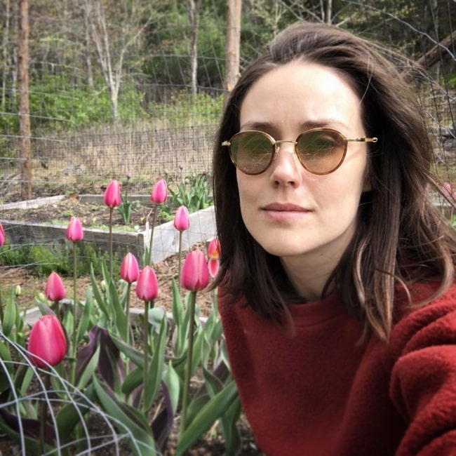 Megan Boone as seen while taking a selfie with beautiful tulips in April 2019