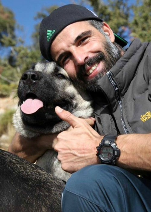 Mehmet Akif Alakurt with his dog as seen in April 2019