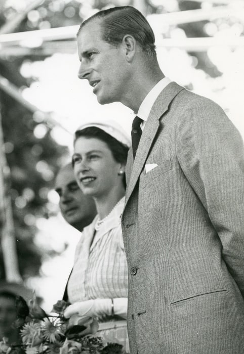 Prince Philip, Duke of Edinburgh as seen in a black-and-white picture, along with Queen Elizabeth II, taken during the Royal Tour of 1953/1954 in Cambridge, Waikato, New Zealand in January 1954