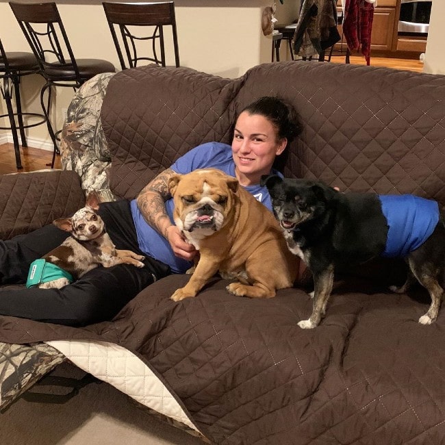 Raquel Pennington with her dogs as seen in December 2019