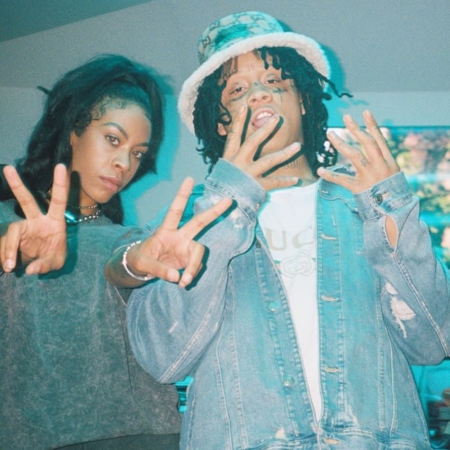 Rico Nasty as seen while posing for a picture alongside Trippie Redd in 2019