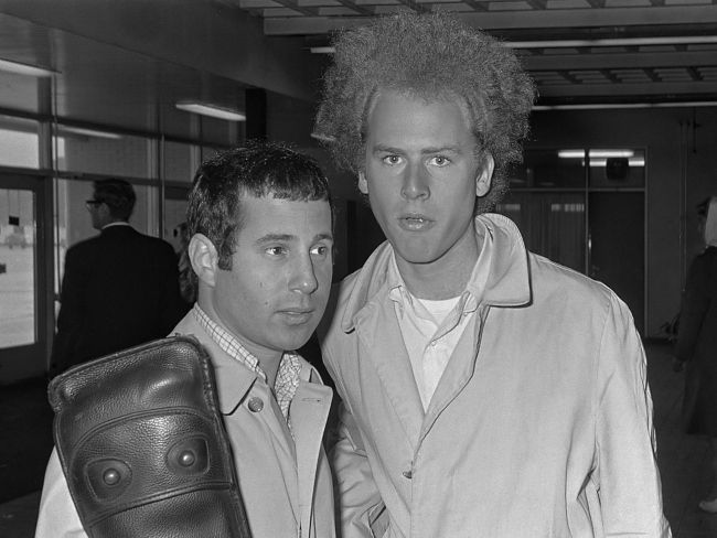 Simon (left) and Garfunkel arriving at the Schiphol Airport in the Netherlands in 1966