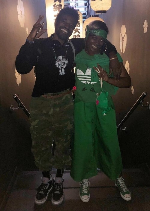 Tierra Whack posing for a post-lunch picture alongside her dad in August 2018