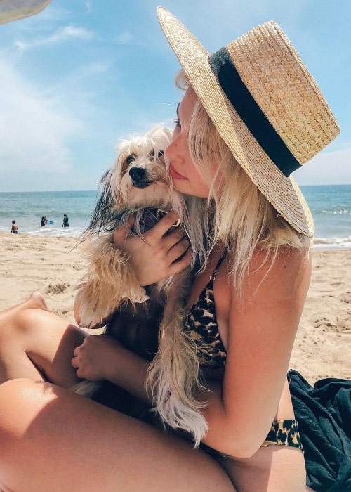 Victoria Baldesarra with her dog as seen in August 2019