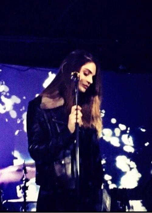 Aimee Osbourne as seen in a picture of her taken during a live performance of her in the past