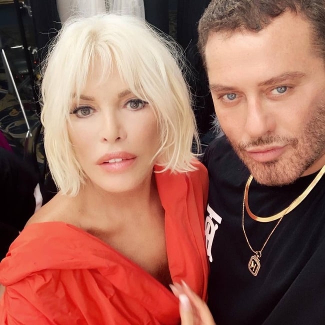 Ajda Pekkan as seen while posing for a picture along with Mert Alas